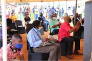 Mpumalanga Provincial Head Mr Fikile Guma part of the audience waiting for the community engagement programme to start